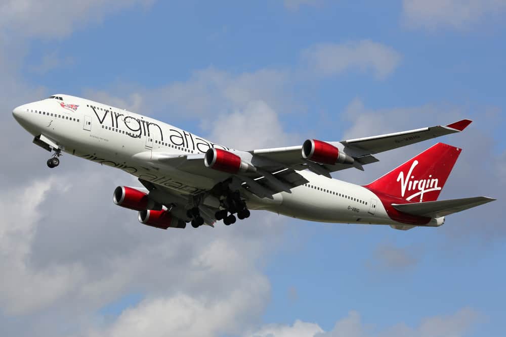 Virgin arlantic  airline is taking off from the arirport.