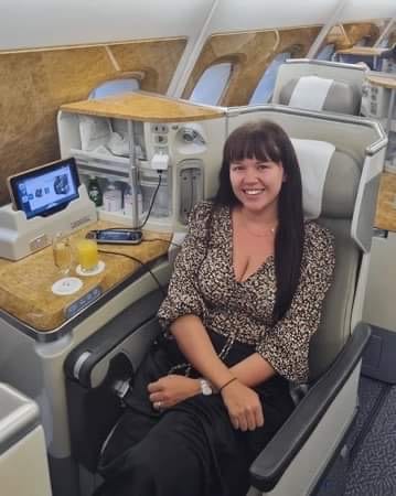 Large Passenger On Emirates Business Class Seat 